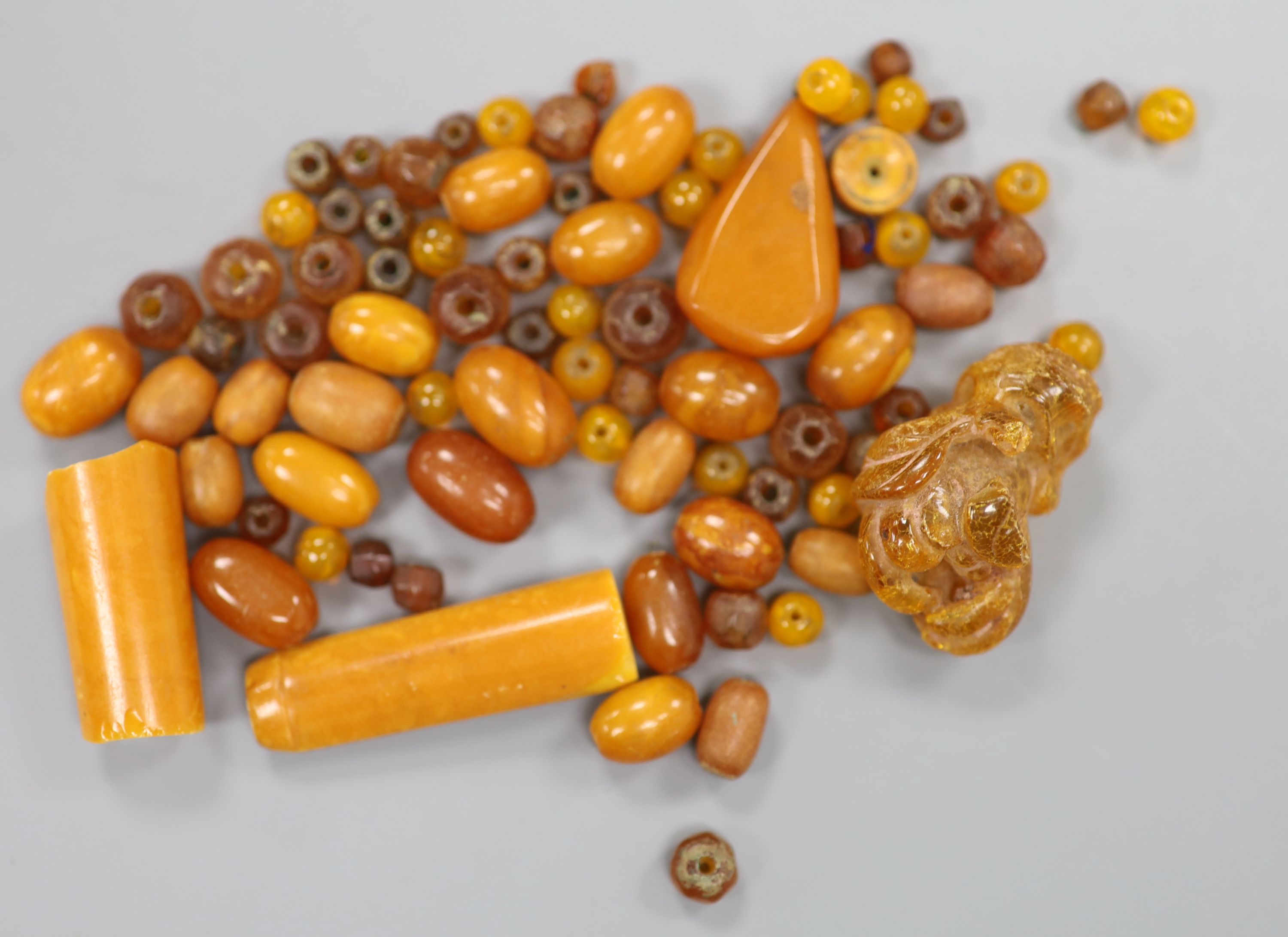 A collection of amber, a Chinese buddha hand amber
